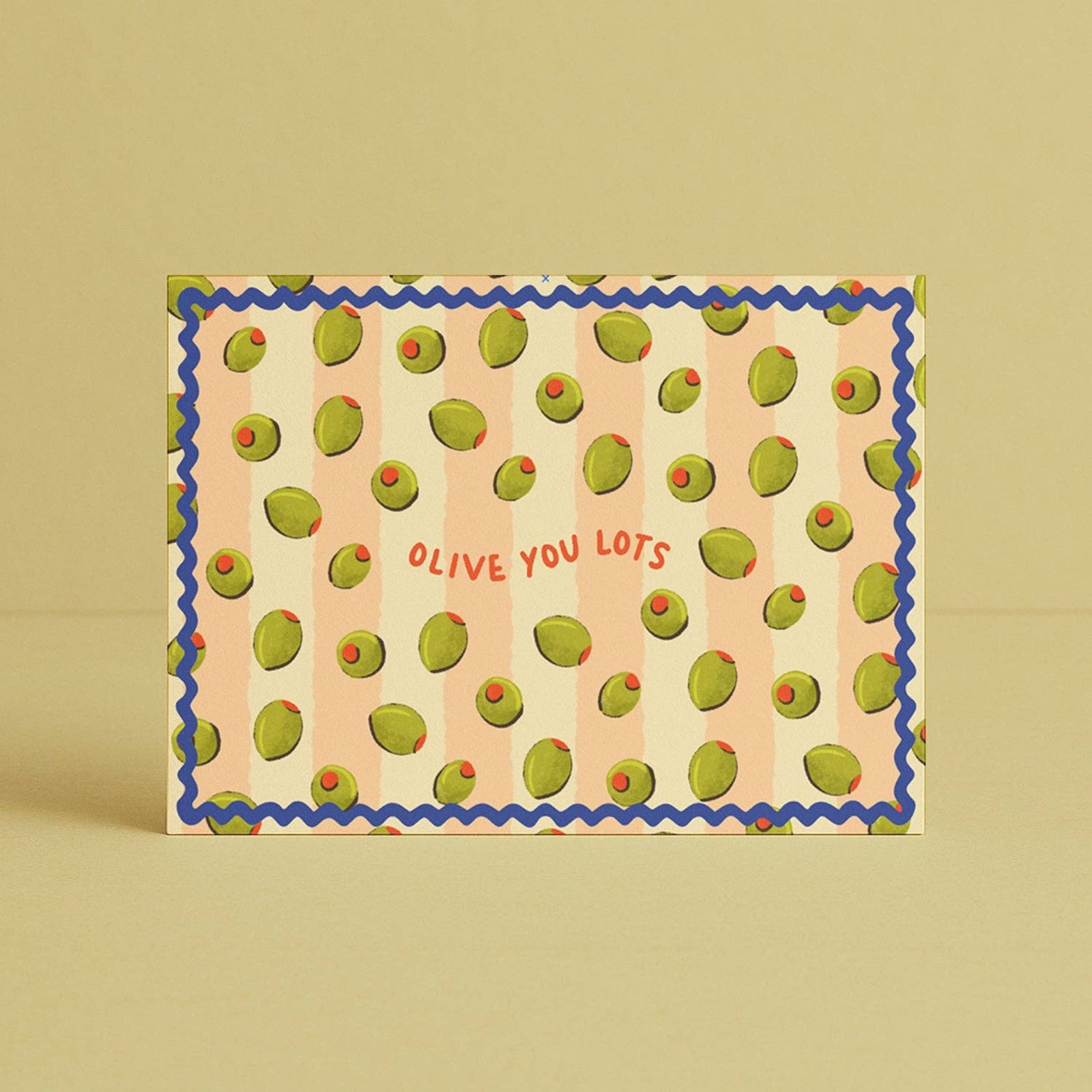 Card with olive pattern and 'Olive You Lots' text on a beige background