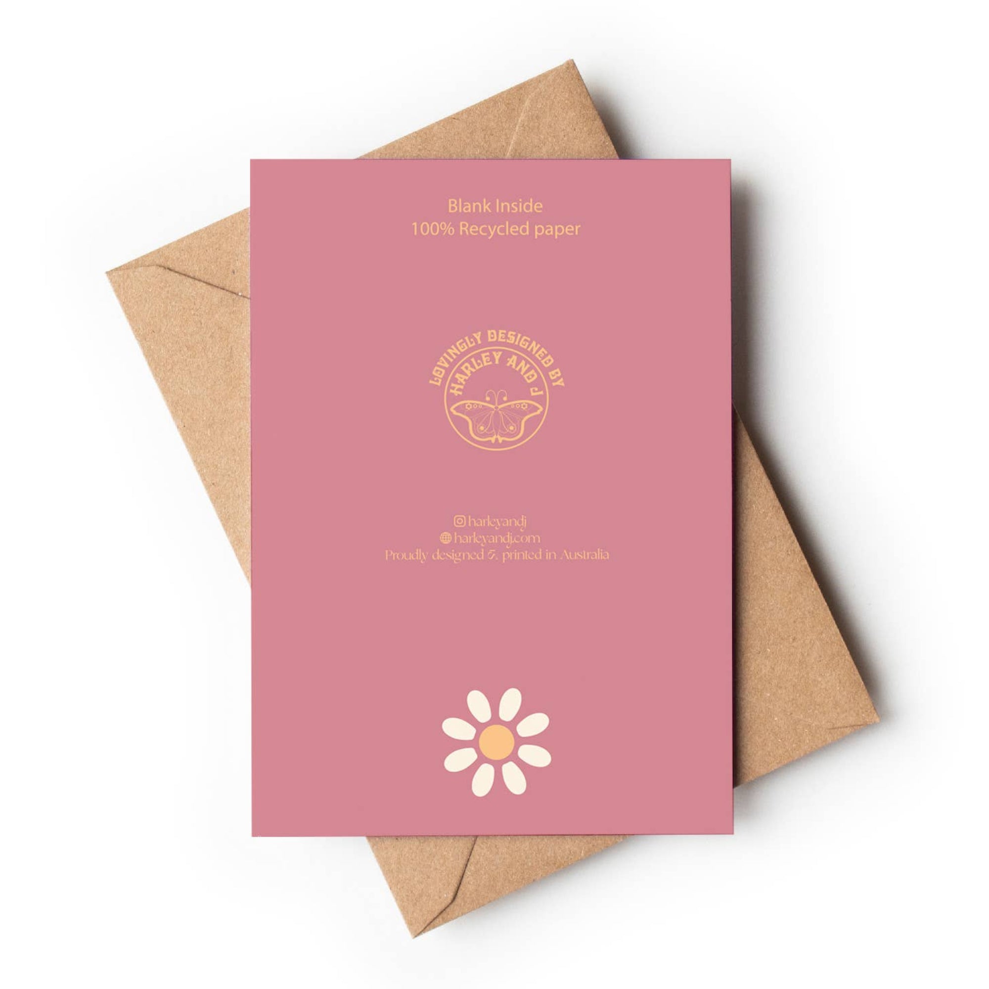 Greeting card with floral design and 'To My Darling Mum' text on a pink background, accompanied by a brown envelope.