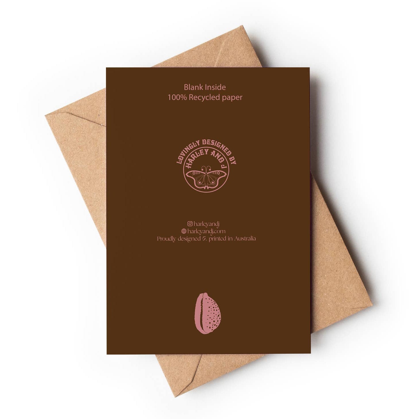 Brown card with text and a logo, placed on a brown envelope against a white background