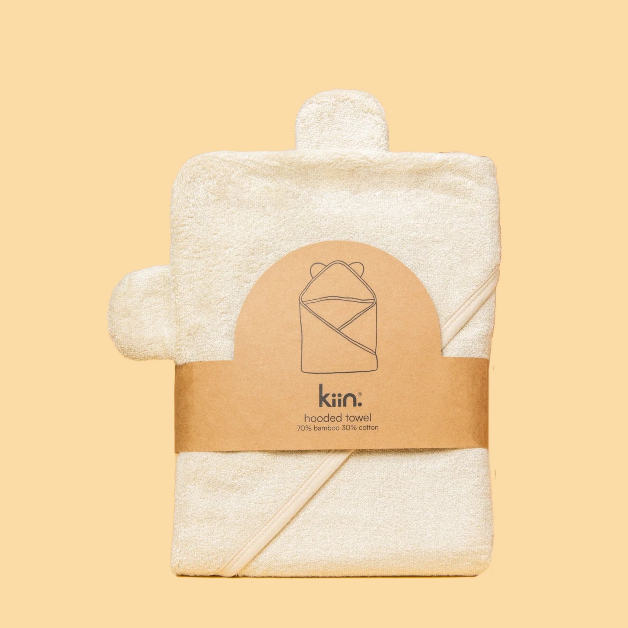 A white hooded towel with bamboo fabric designed for babies, displayed against a neutral background.