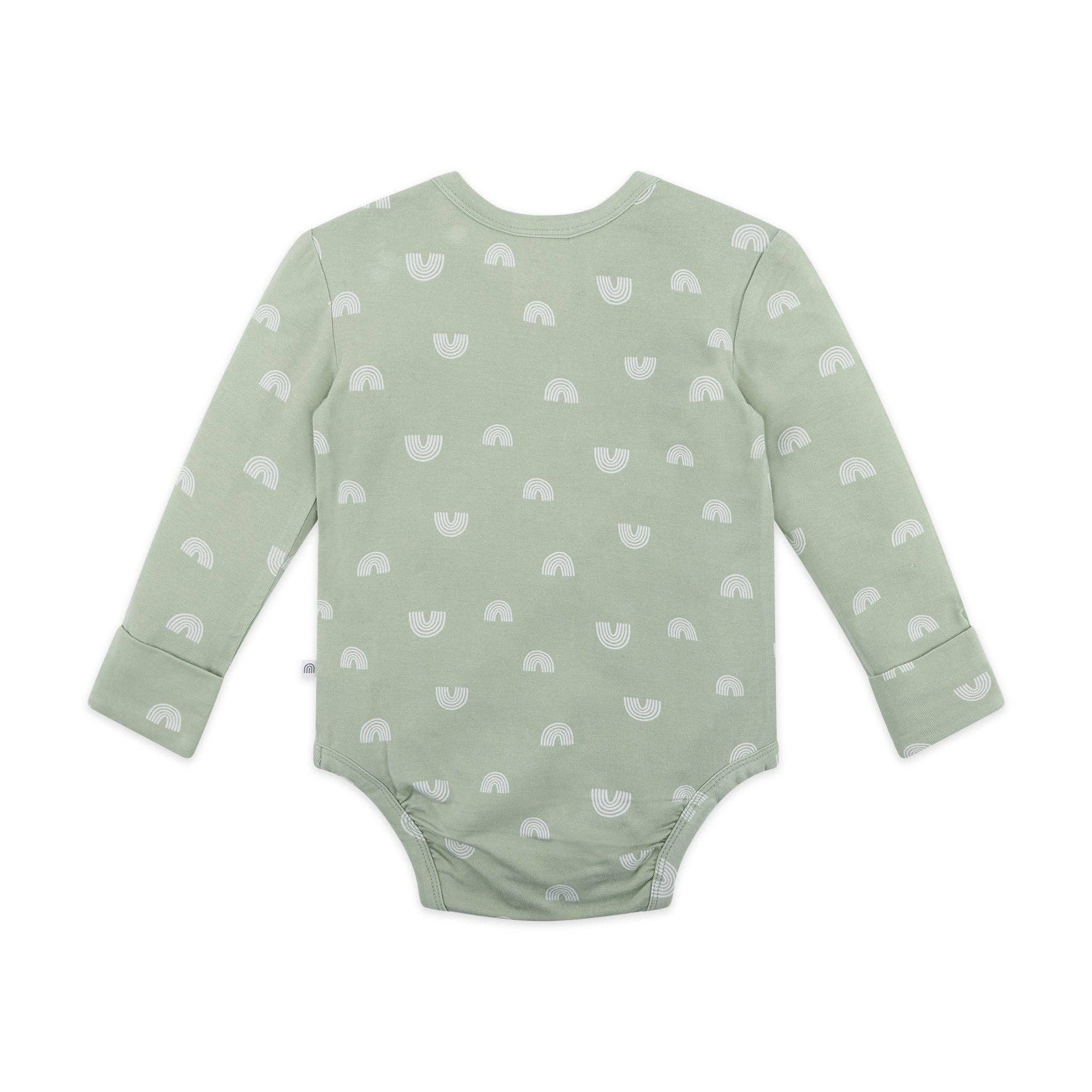 Green baby onesie with white pattern on a white background