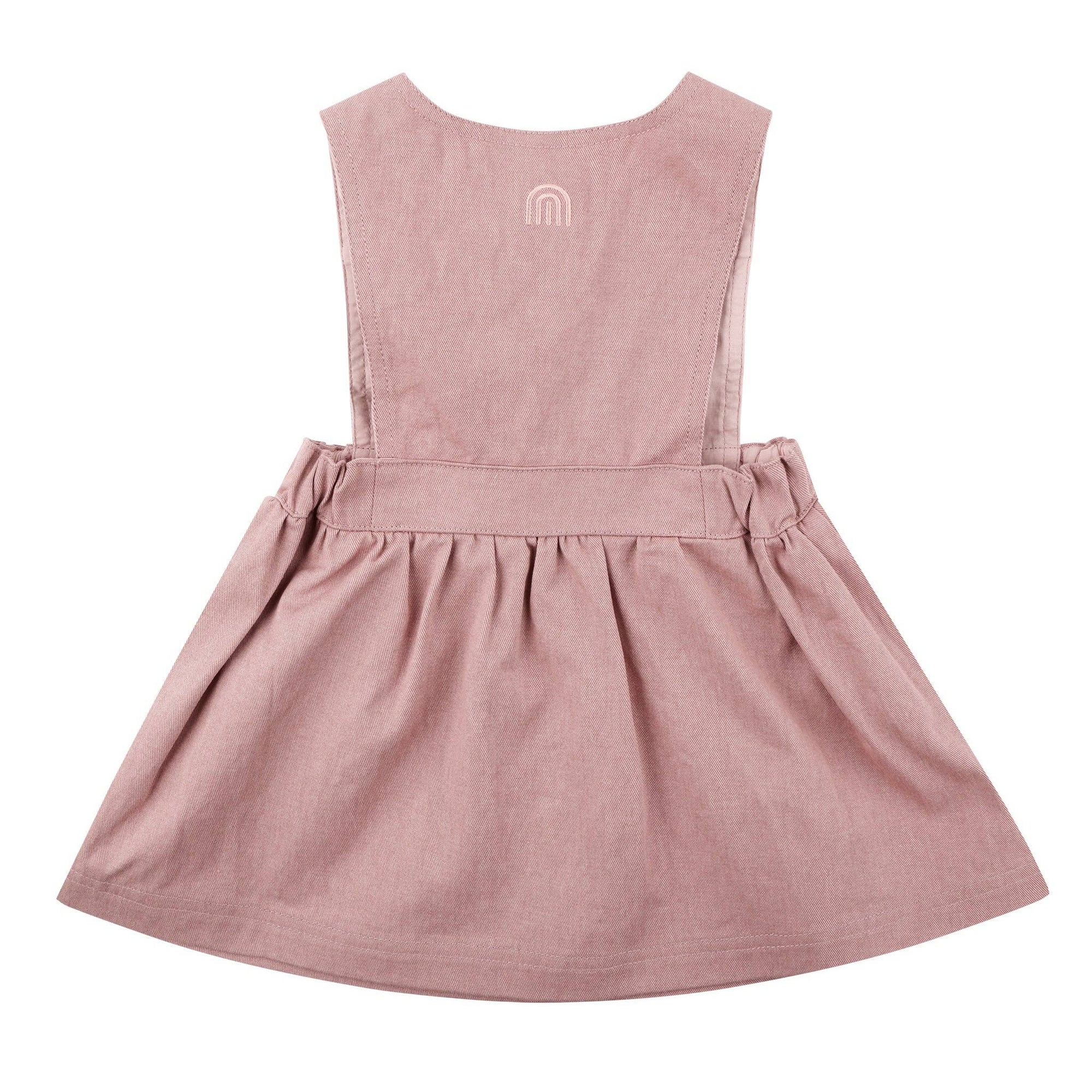 Pink dress with a brand logo on the back against a white background