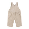 Beige ribbed overalls on a white background